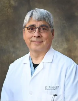 Dr Enrique Gil